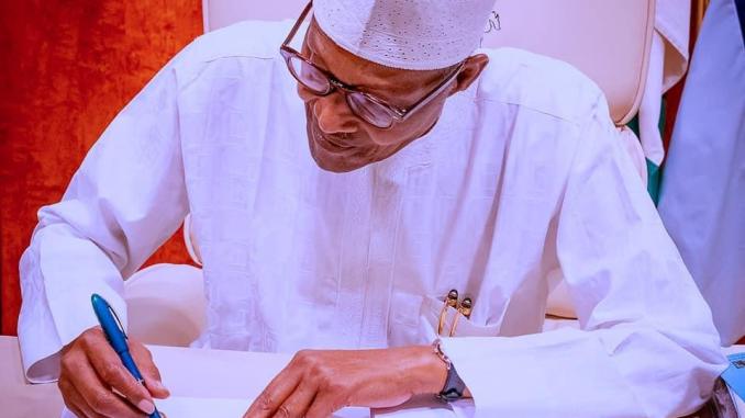 BREAKING: Buhari signs electoral bill into law